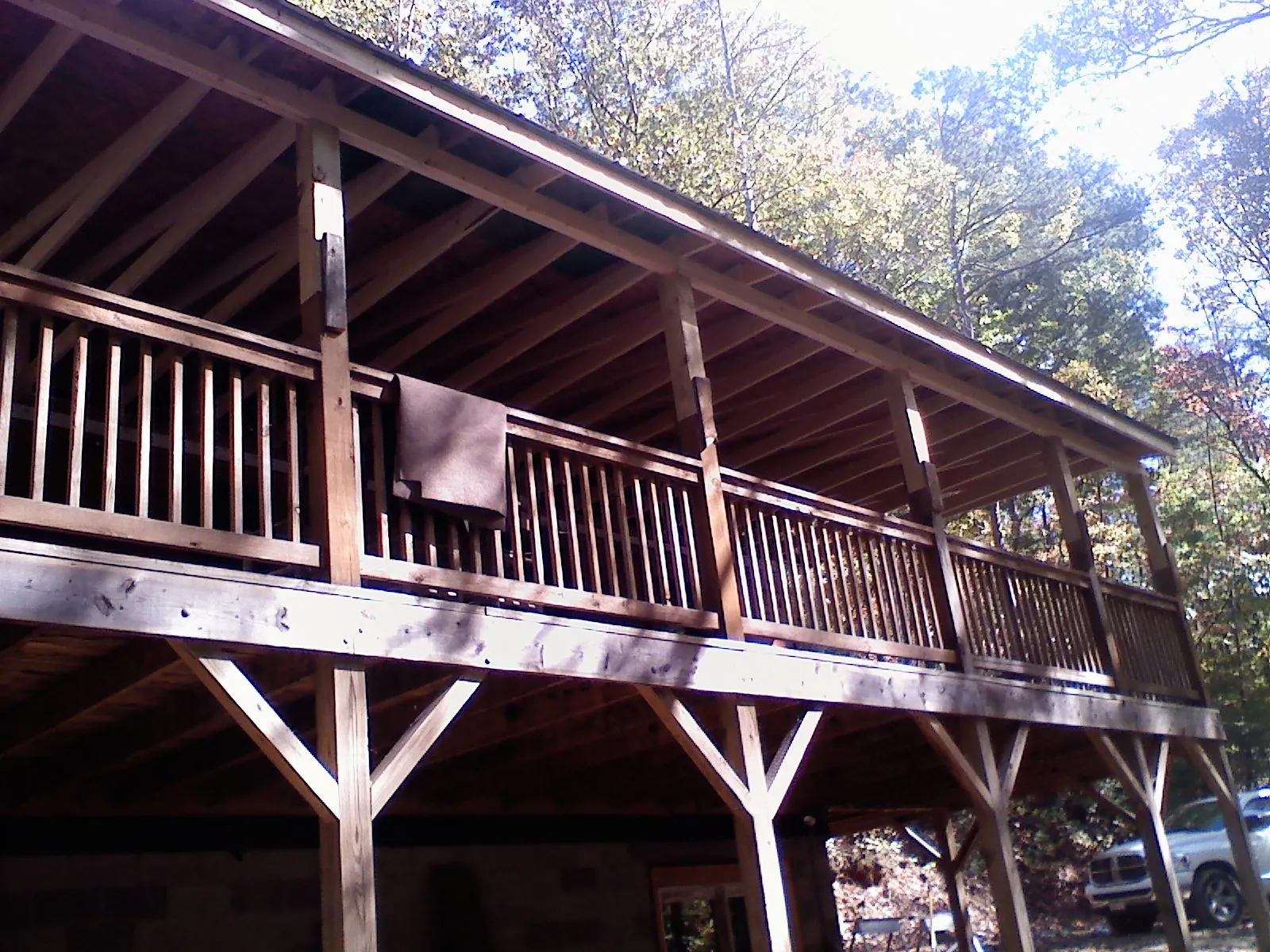 Timber framing under a new elevated porch and deck — Roof Leak Repair in Bernardsville by Roofing Brothers
